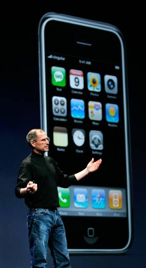 Steve Jobs in front of big Apple iPhone