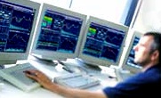 stock option trader at trading system with multi monitor 4 screens